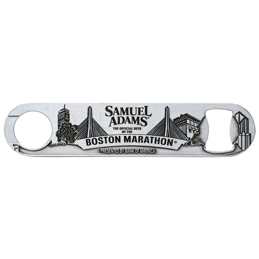 A Boston marathon paddle bottle opener featuring the Boston city-scape and the Samuel Adams logo.