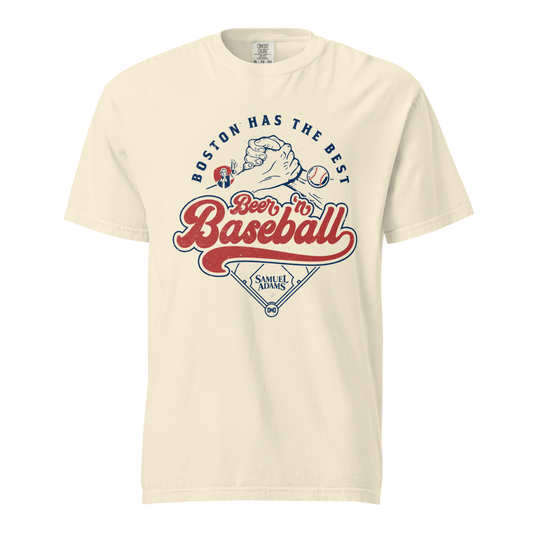 Cream Samuel Adams graphic T‑shirt  showing retro ‘Boston Has the Best Beer ’n Baseball’ lettering, handshake illustration, baseball icon, and home plate design.