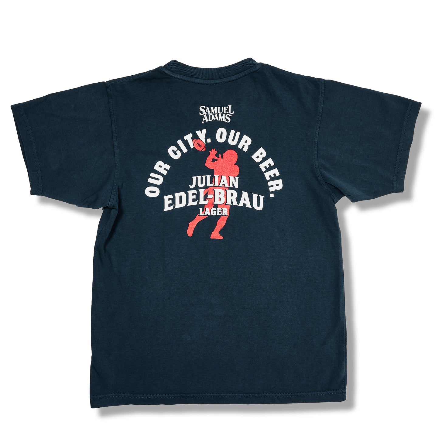 A dark navy blue t-shirt shown from the back, featuring a red and white graphic print with the text 'SAMUEL ADAMS', 'OUR CITY. OUR BEER.