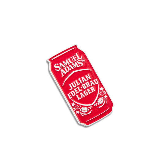 A red die-cut pin shaped like a Samuel Adams Julian Edel-Brau Lager beer can, shown on a plain white background.