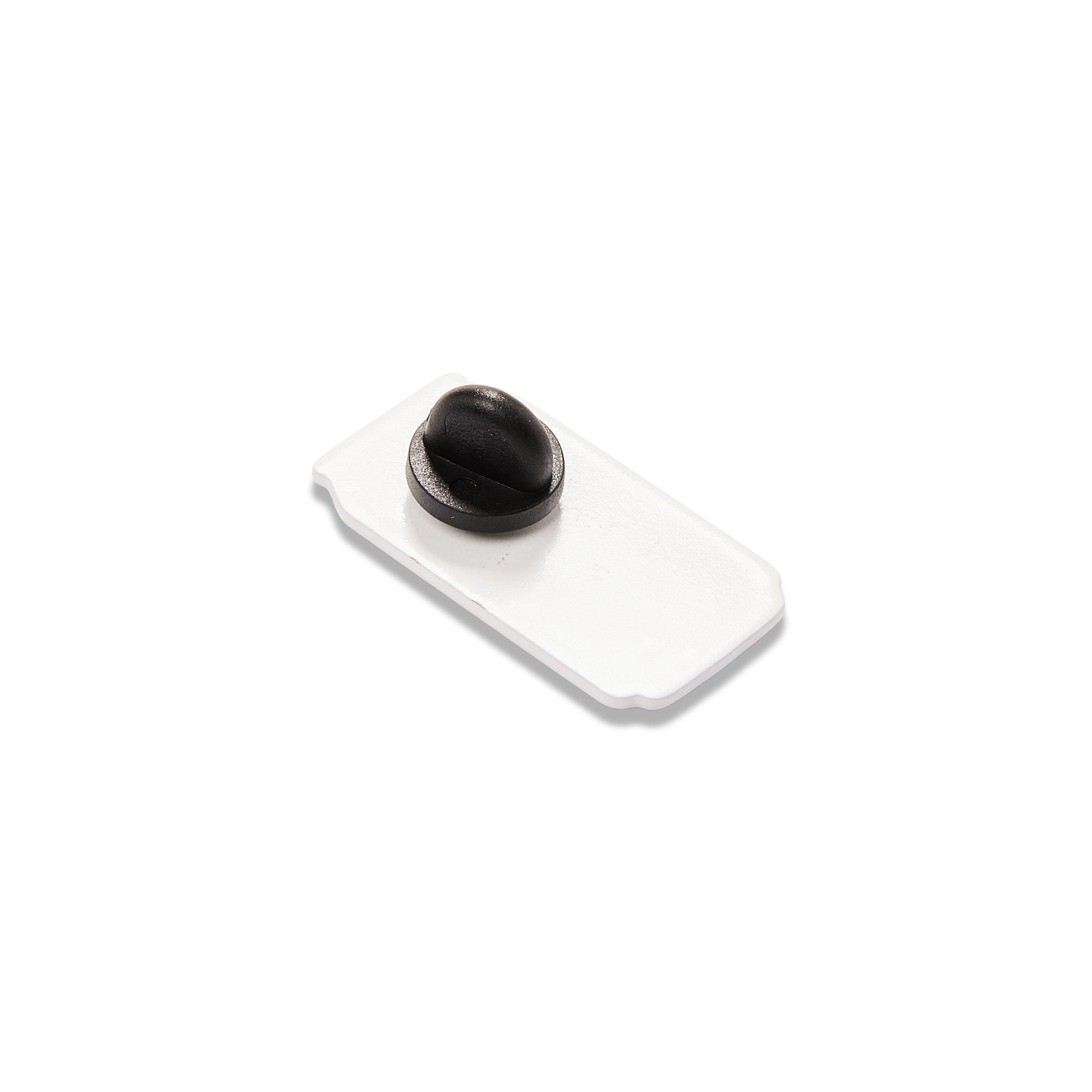 A small white pin with a black oval button or stud on top, photographed on a clean white background.
