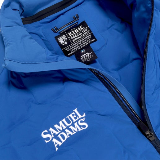 Close up of tag on KUHL Royal Firestorm Down Full Zip Jacket in Rally Blue