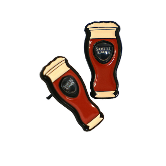Soft enamel pair of earrings made to look like a perfect pint glass full of Sam Adams beer.