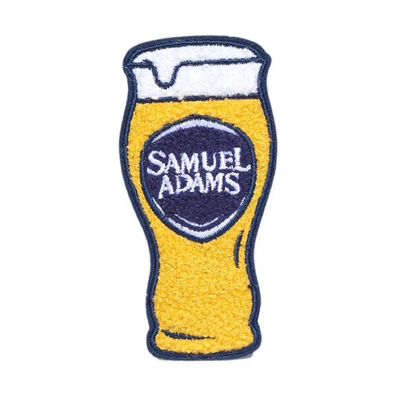 A patch made to look like a Samuel Adams perfect pint.