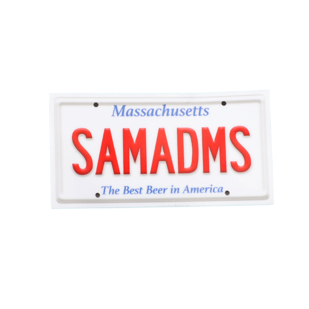 White license plate sticker is from Massachusetts in blue, number is SAMADMS in red, and features writing "The Best Beer in America" in blue on the bottom.