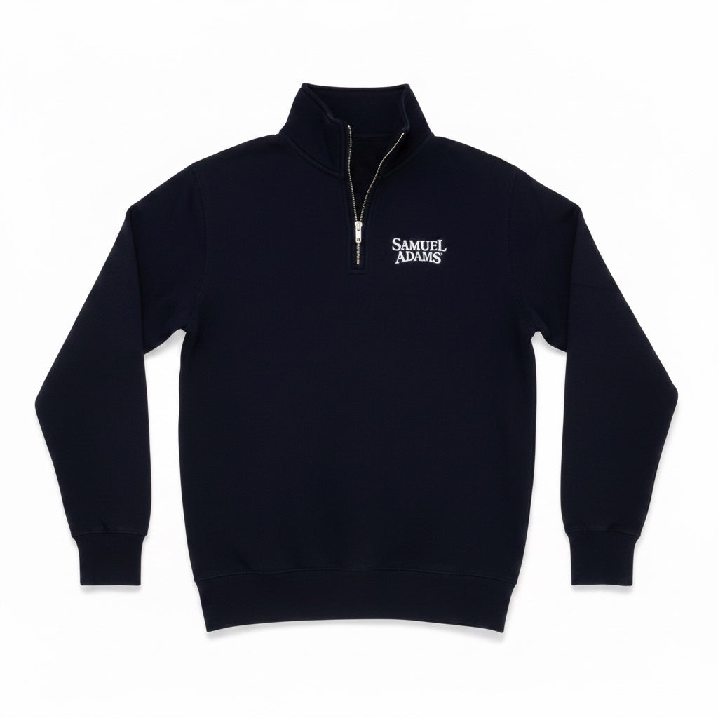 A navy quarter zip sweatshirt with the Sam Adams logo in white on the right side. The collar is partially unzipped. The sweatshirt is against a white background. 