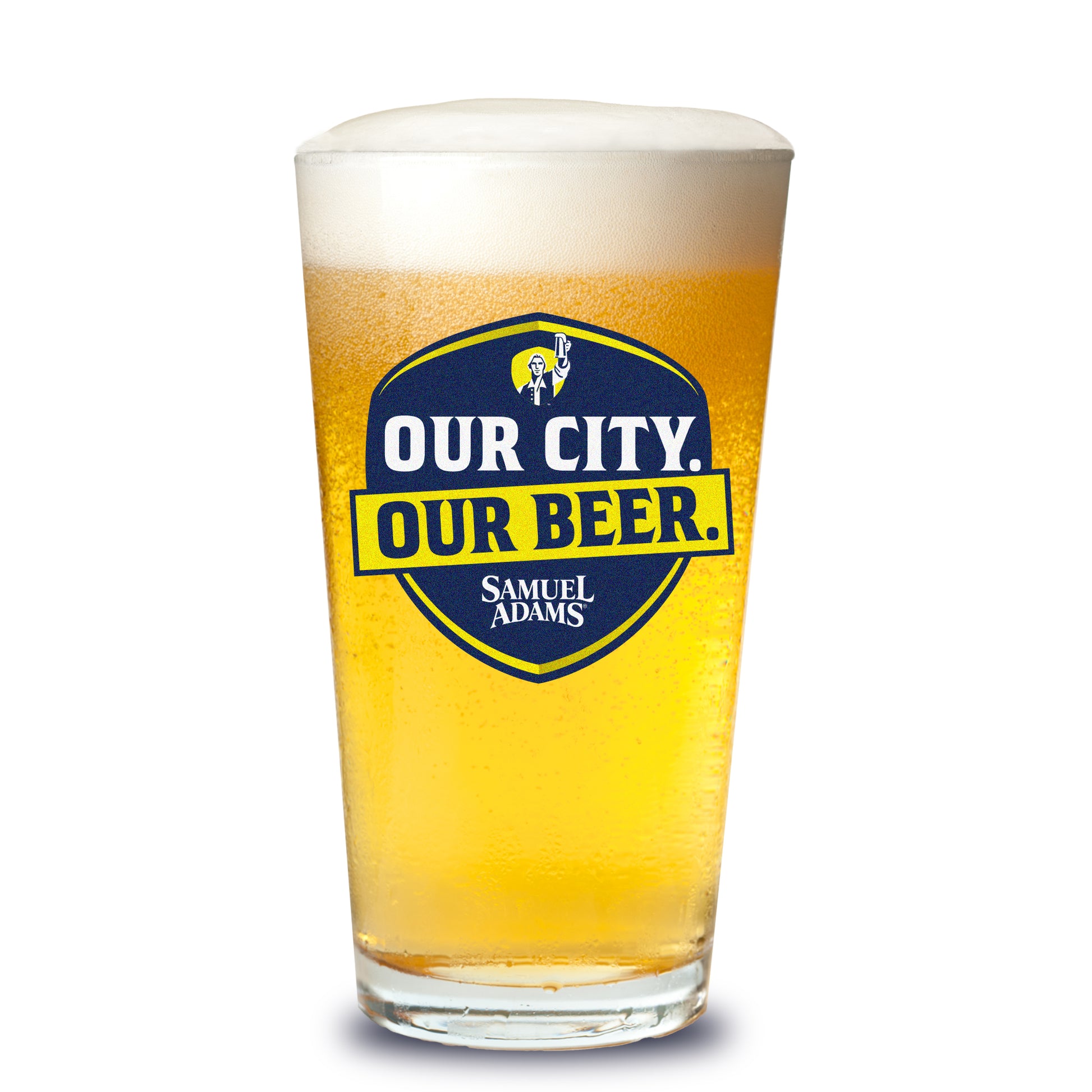 A Samuel Adams pint glass filled with golden beer showing the navy‑and‑gold “OUR CITY. OUR BEER.” shield logo with the Samuel Adams icon above and the Samuel Adams wordmark below.