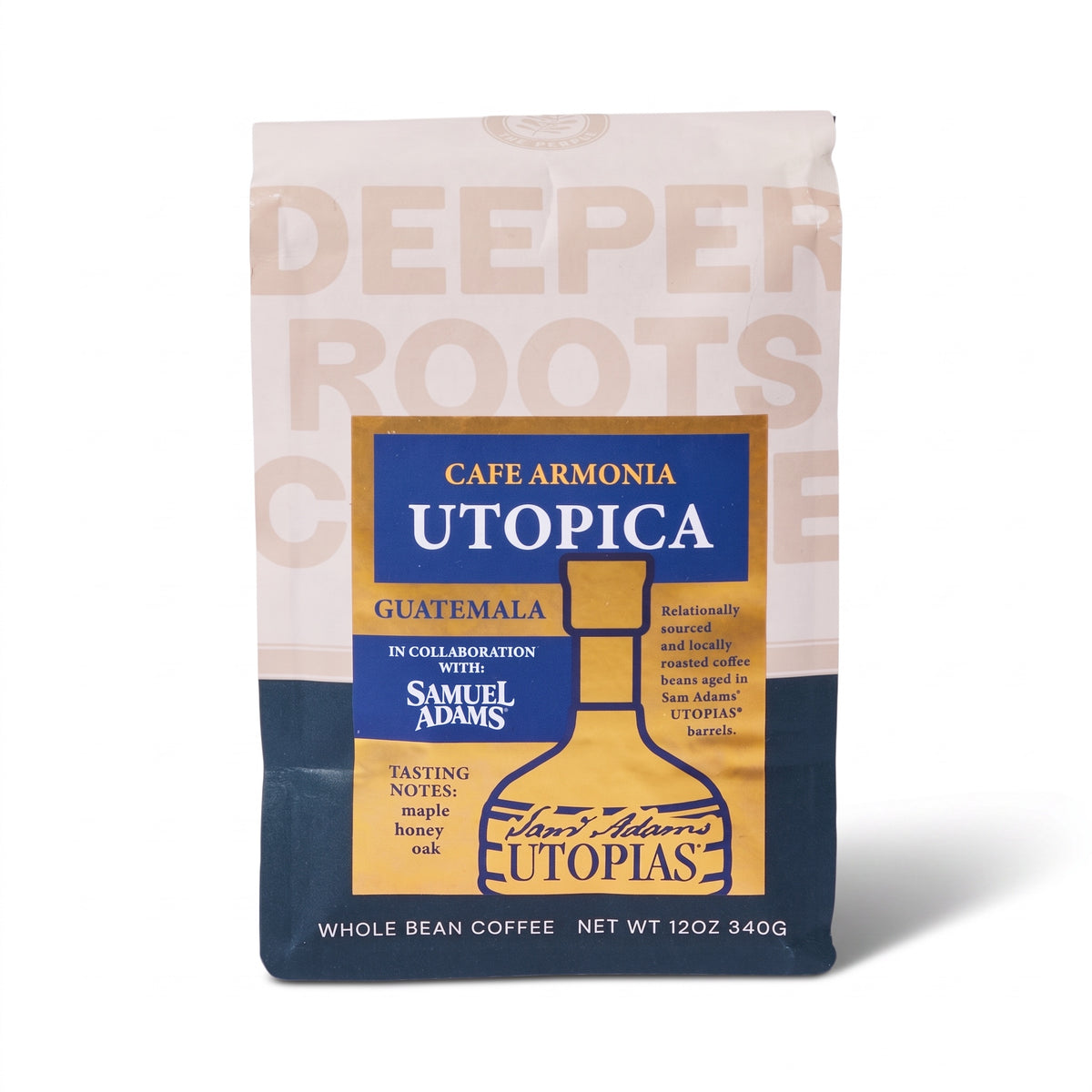 A 12 oz bag of Tim's Adams Utopica whole bean coffee, featuring a cream and navy blue package with gold accents and a central blue and gold label.