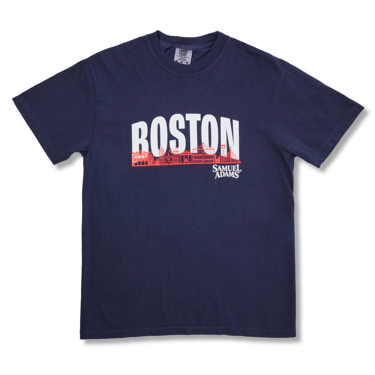 A navy blue short-sleeve t-shirt with a graphic on the chest featuring the word 'BOSTON' in large white letters over a red skyline, with 'SAMUEL ADAMS' printed below in white.