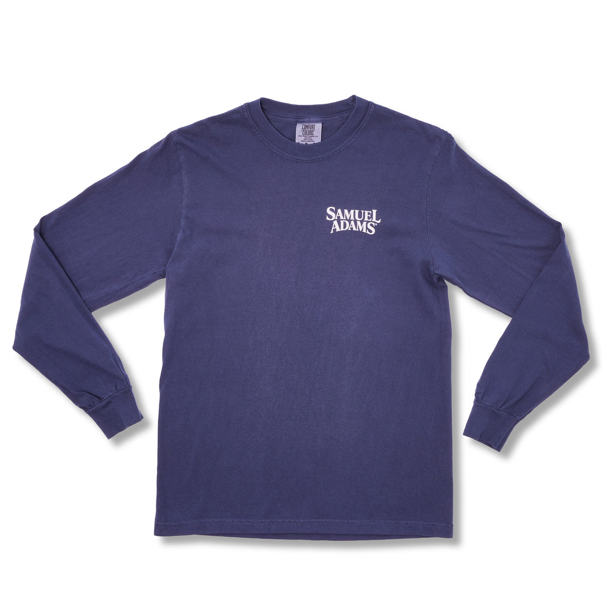 A long-sleeve crewneck t-shirt in a washed navy blue color, featuring the text 'SAMUEL ADAMS' printed in white on the left chest, laid flat against a white background.