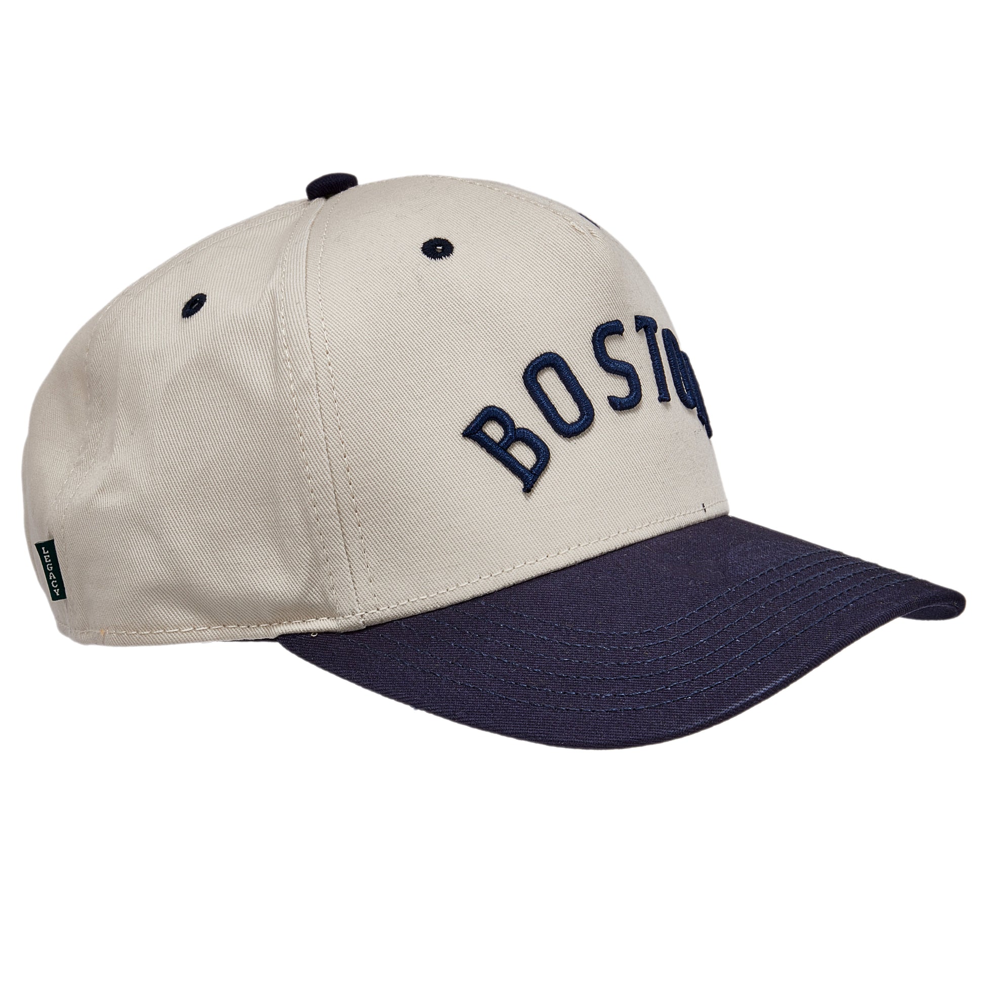 Two tone hat, white cap and navy brim. Raised embroidered Boston text across front.