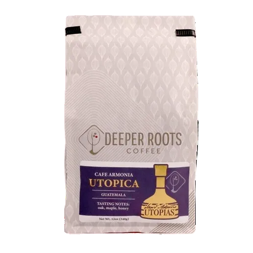 Utopias Barrel Aged Coffee Beans packaged in a white and grey bag.