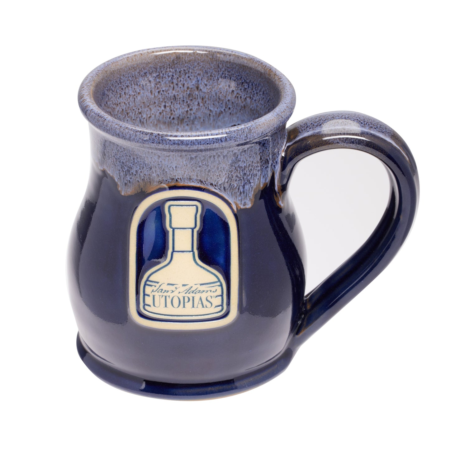 Navy blue mug with a blue glaze up top. Mug features artwork of limited edition Utopias bottle.
