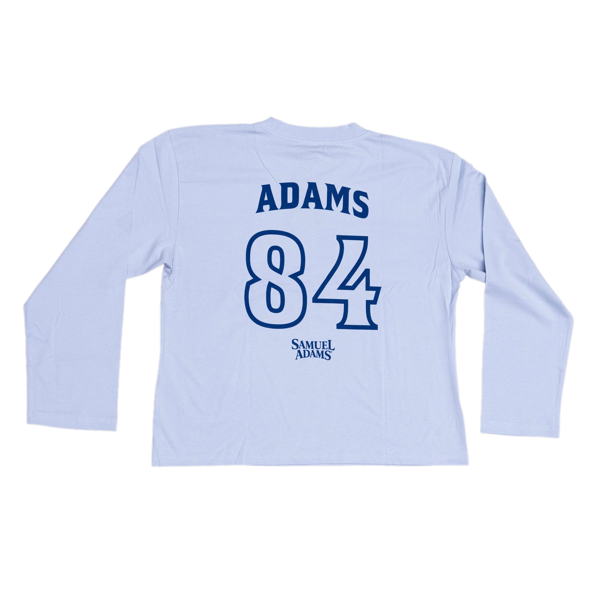 Blue long sleeve in a jersey style with writing in a darker blue. 'Name' on tee is Adams and number is 84. Under both the Samuel Adams logo is featured.
