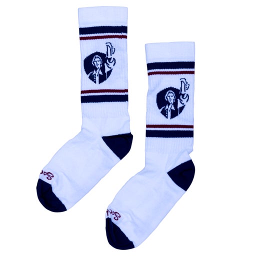 White socks with Samuel Adams written along the bottom of the foot in navy.  The leg of the sock features a navy shield with Sam Adams hoisting a beer on it.