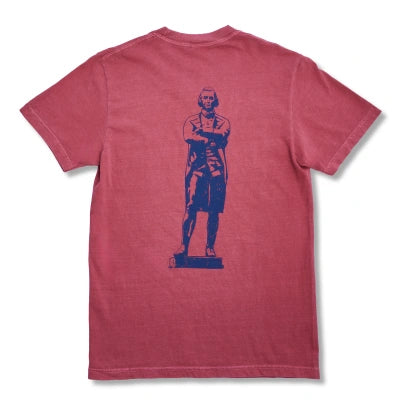 A heathered pinkish-red short-sleeve t-shirt shown from the back, featuring a dark blue graphic print of a historical statue of Samuel Adams.